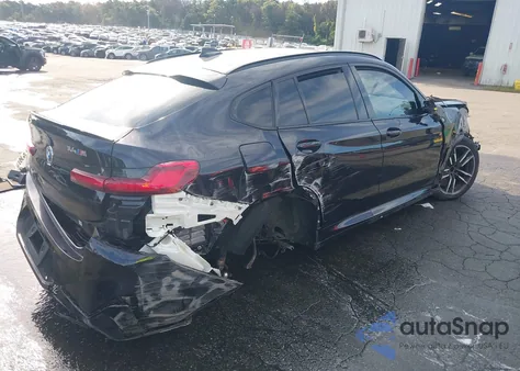 2022 BMW X4 M z USA, uszkodzony, nr VIN 5YM23EC00N9J37507